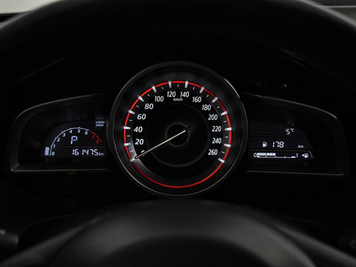 Mazda 3 с пробегом — 2014 год. Фото: #17