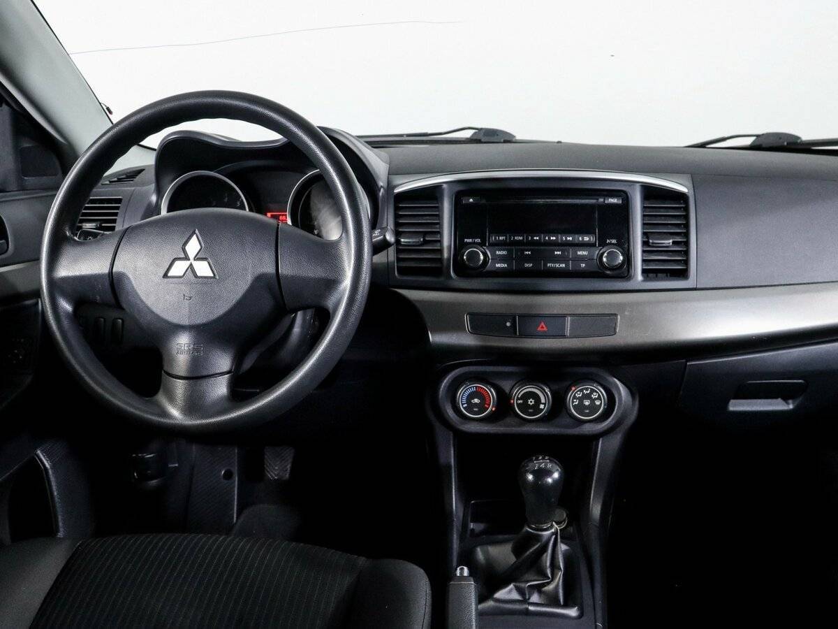 Mitsubishi Lancer с пробегом — 2014 год. Фото: #10