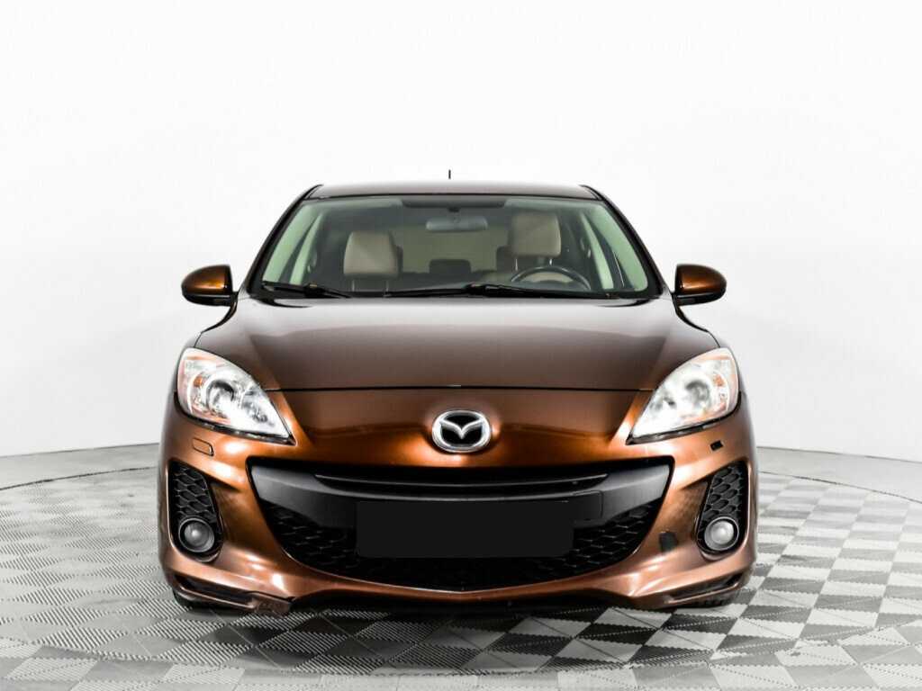 Mazda 3 с пробегом — 2012 год. Фото: #1