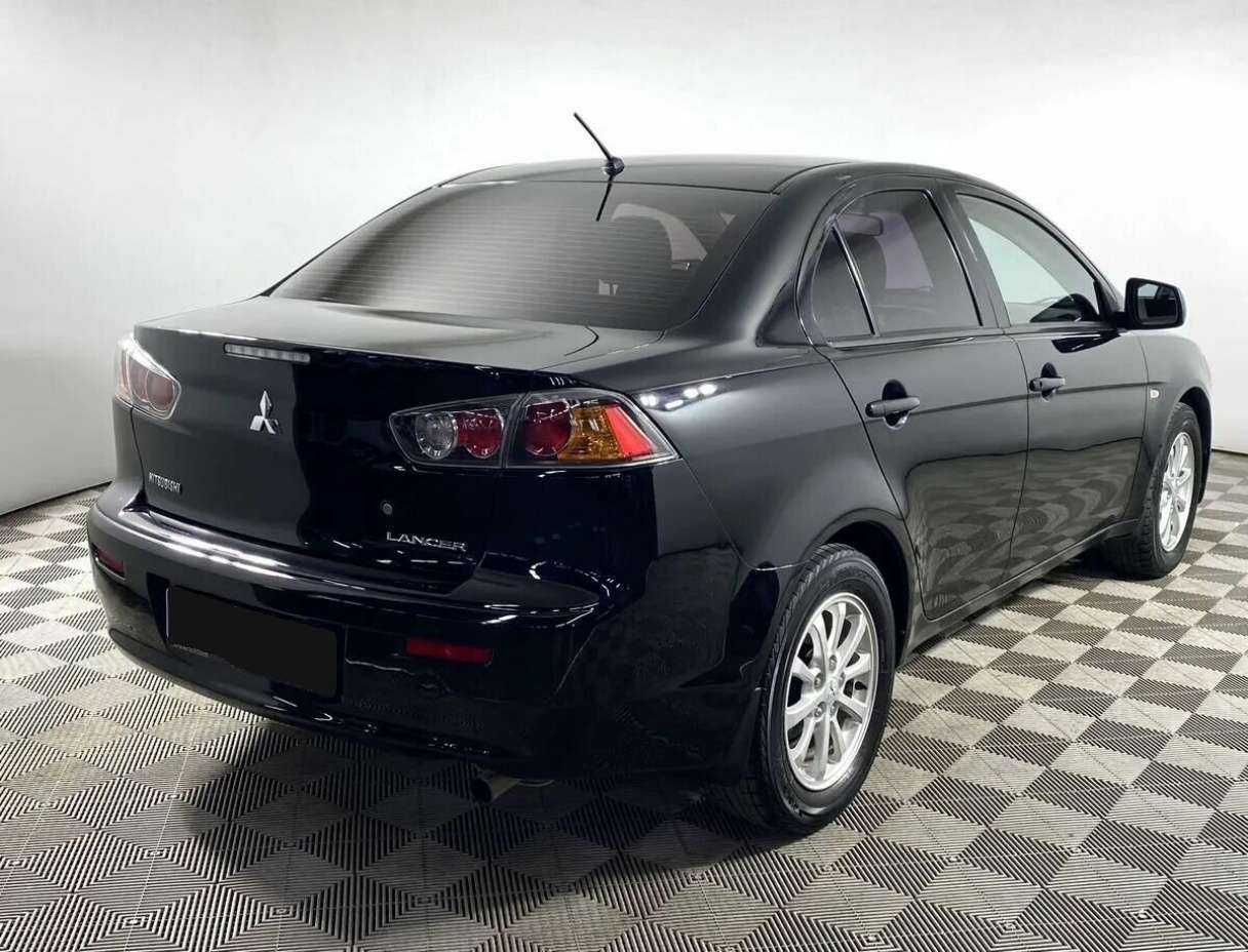 Mitsubishi Lancer с пробегом — 2012 год. Фото: #2