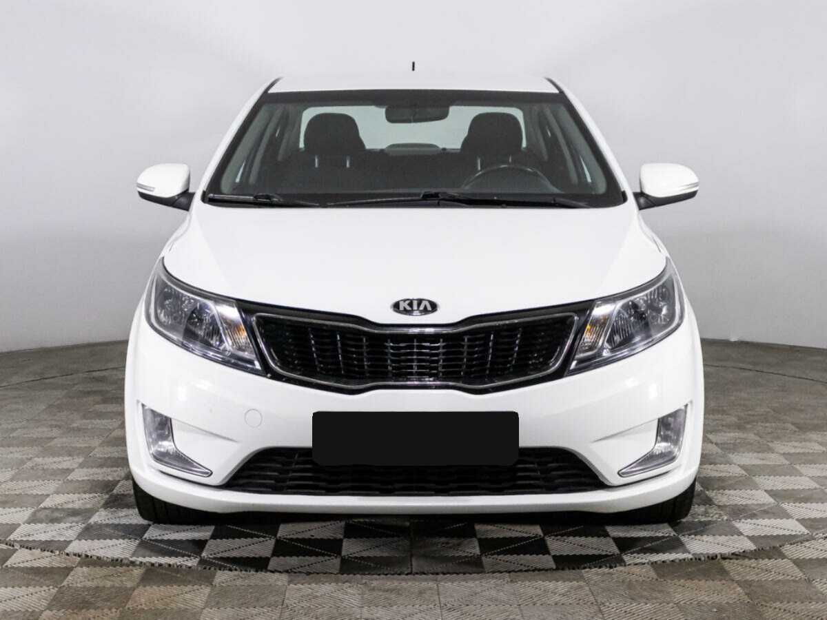 Kia Rio с пробегом — 2014 год. Фото: #1