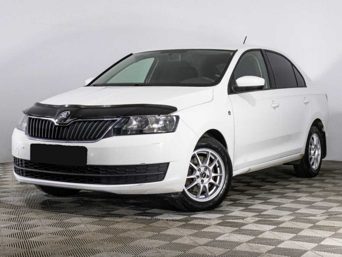 Skoda Rapid с пробегом — 2014 год. Посмотреть фото