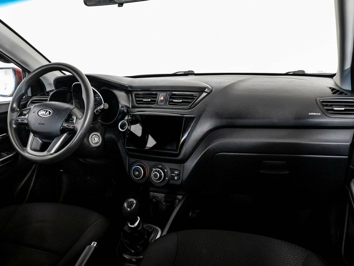 Kia Rio с пробегом — 2012 год. Фото: #6
