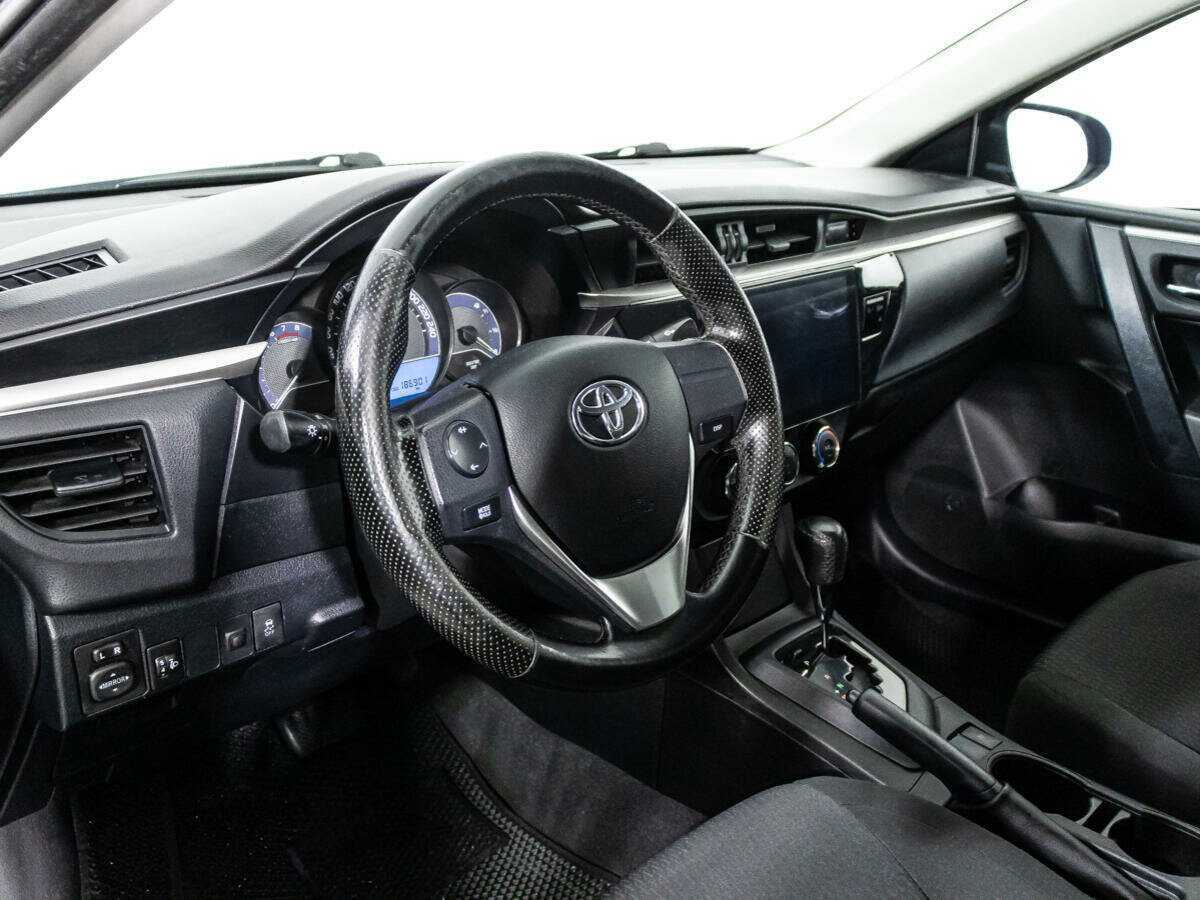 Toyota Corolla с пробегом — 2013 год. Фото: #10