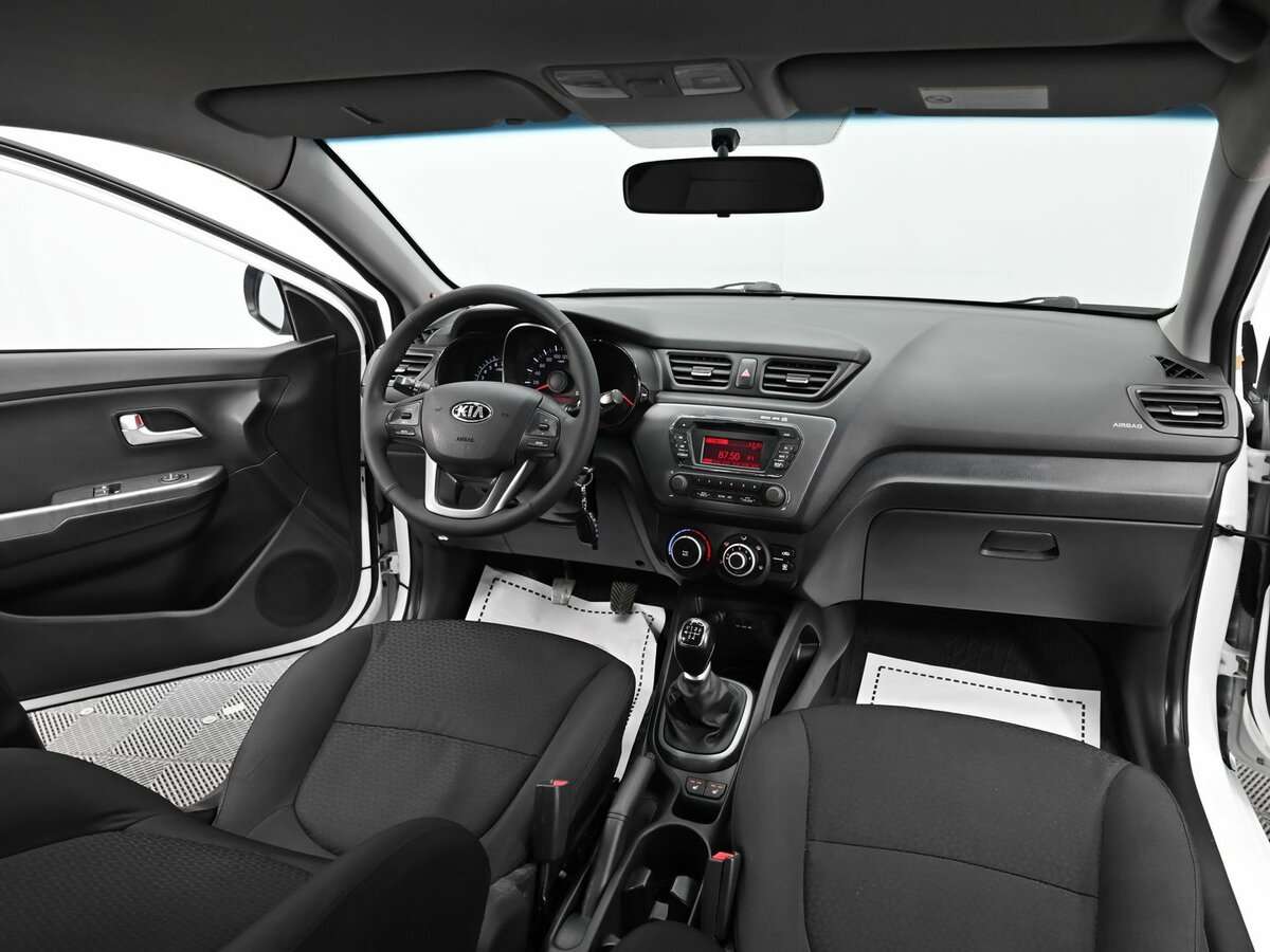 Kia Rio с пробегом — 2013 год. Фото: #12