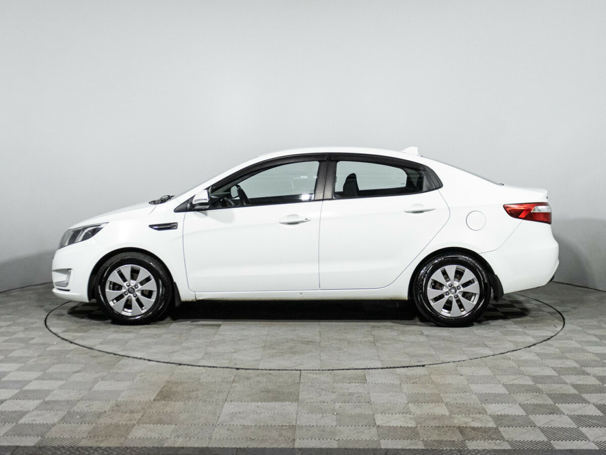 Kia Rio с пробегом — 2013 год. Фото: #7