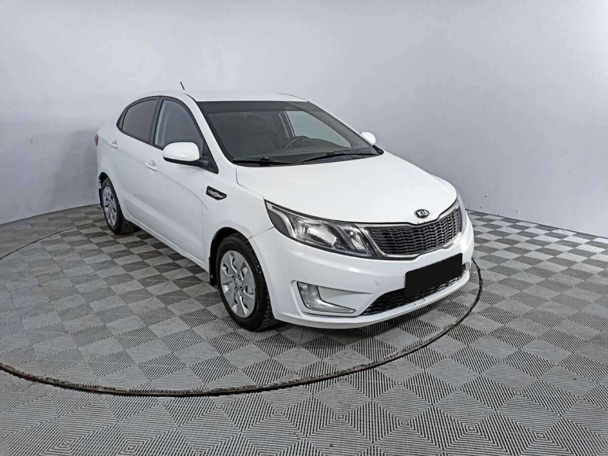 Kia Rio с пробегом — 2014 год. Фото: #2