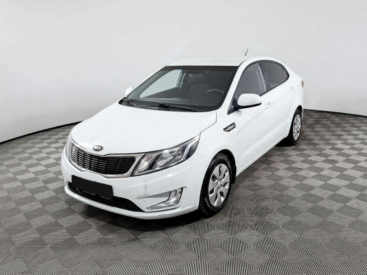 Kia Rio с пробегом — 2013 год. Фото: #0