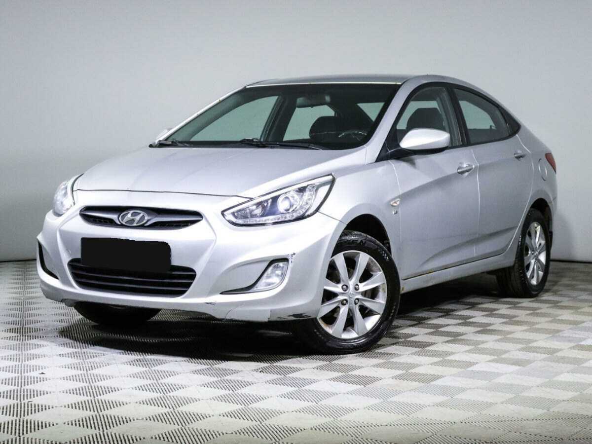 Hyundai Solaris с пробегом — 2013 год. Фото: #0