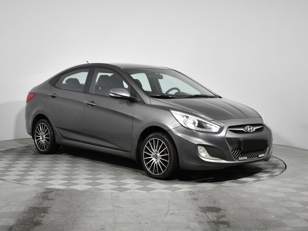 Hyundai Solaris с пробегом — 2013 год. Фото: #2
