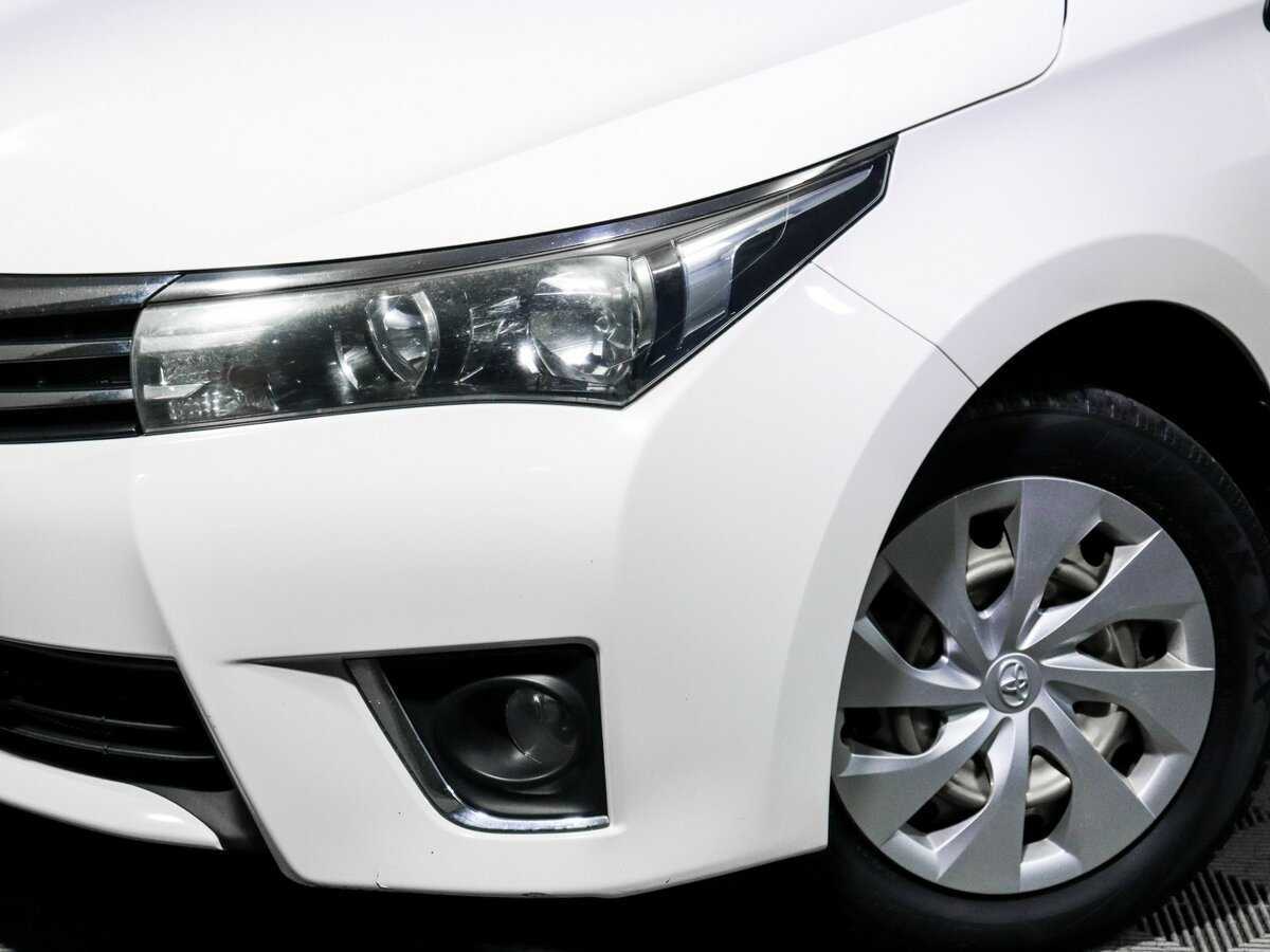 Toyota Corolla с пробегом — 2014 год. Фото: #15