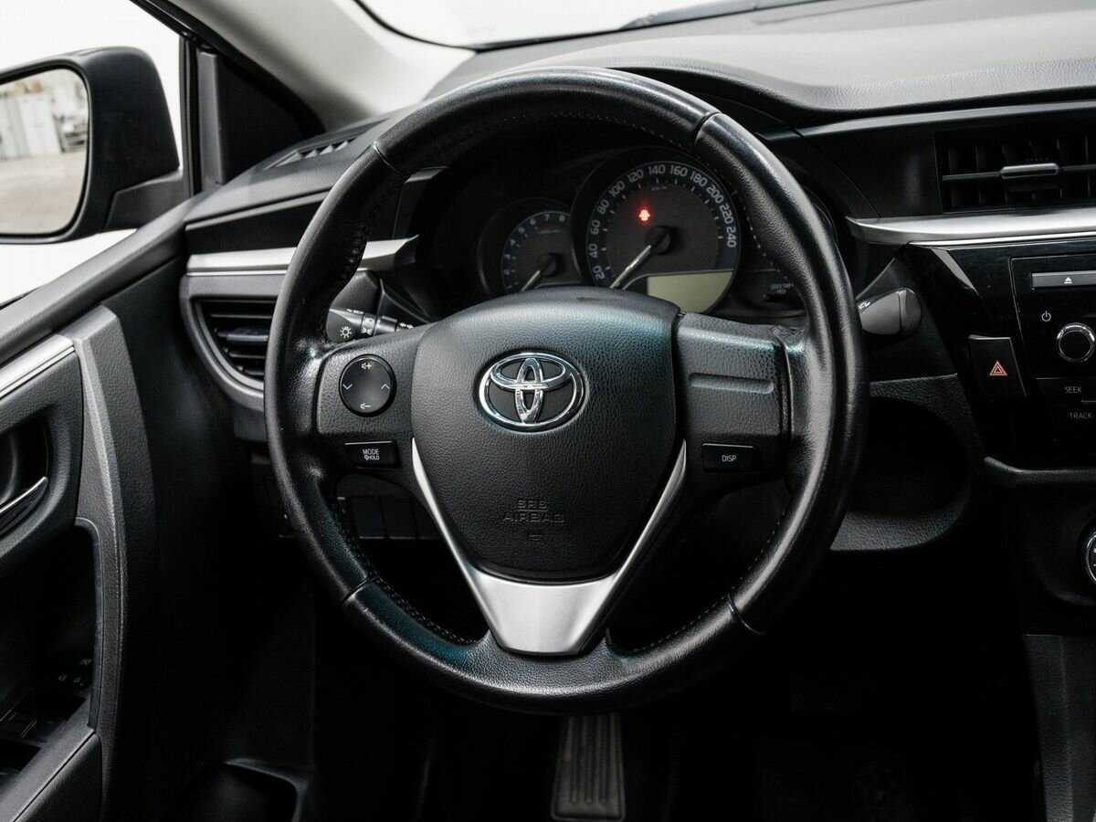 Toyota Corolla с пробегом — 2015 год. Фото: #11