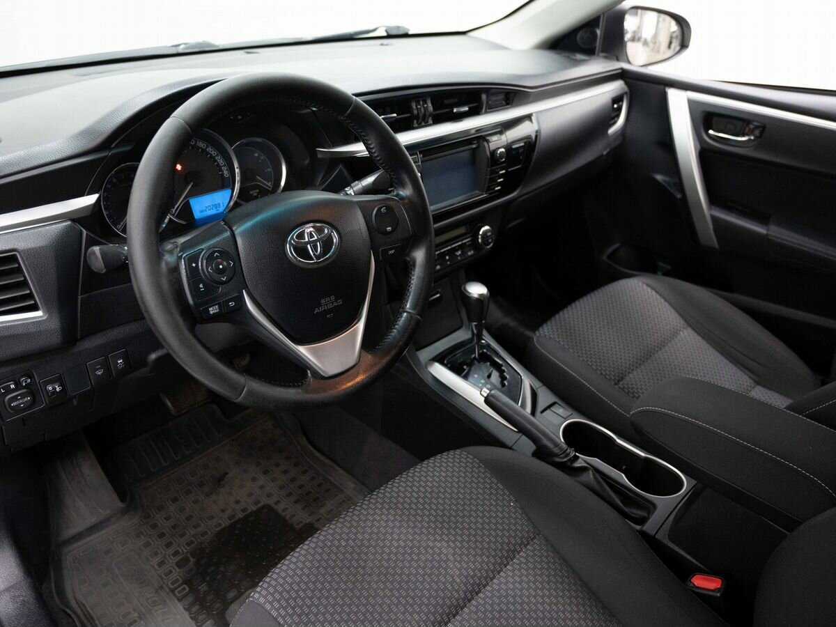 Toyota Corolla с пробегом — 2013 год. Фото: #8