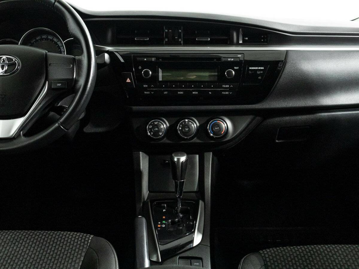 Toyota Corolla с пробегом — 2013 год. Фото: #13