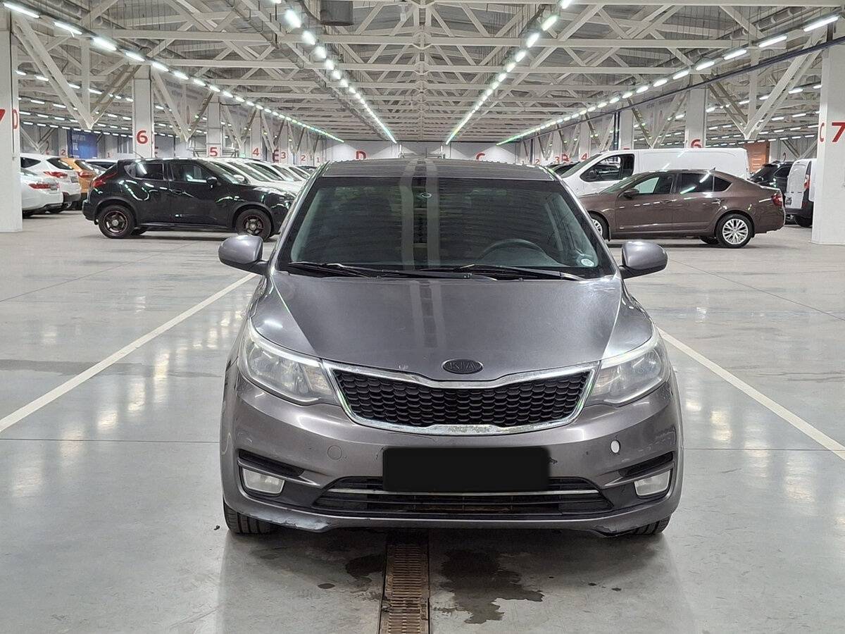 Kia Rio с пробегом — 2015 год. Фото: #1