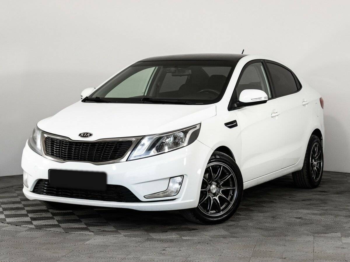 Kia Rio с пробегом — 2012 год. Фото: #0