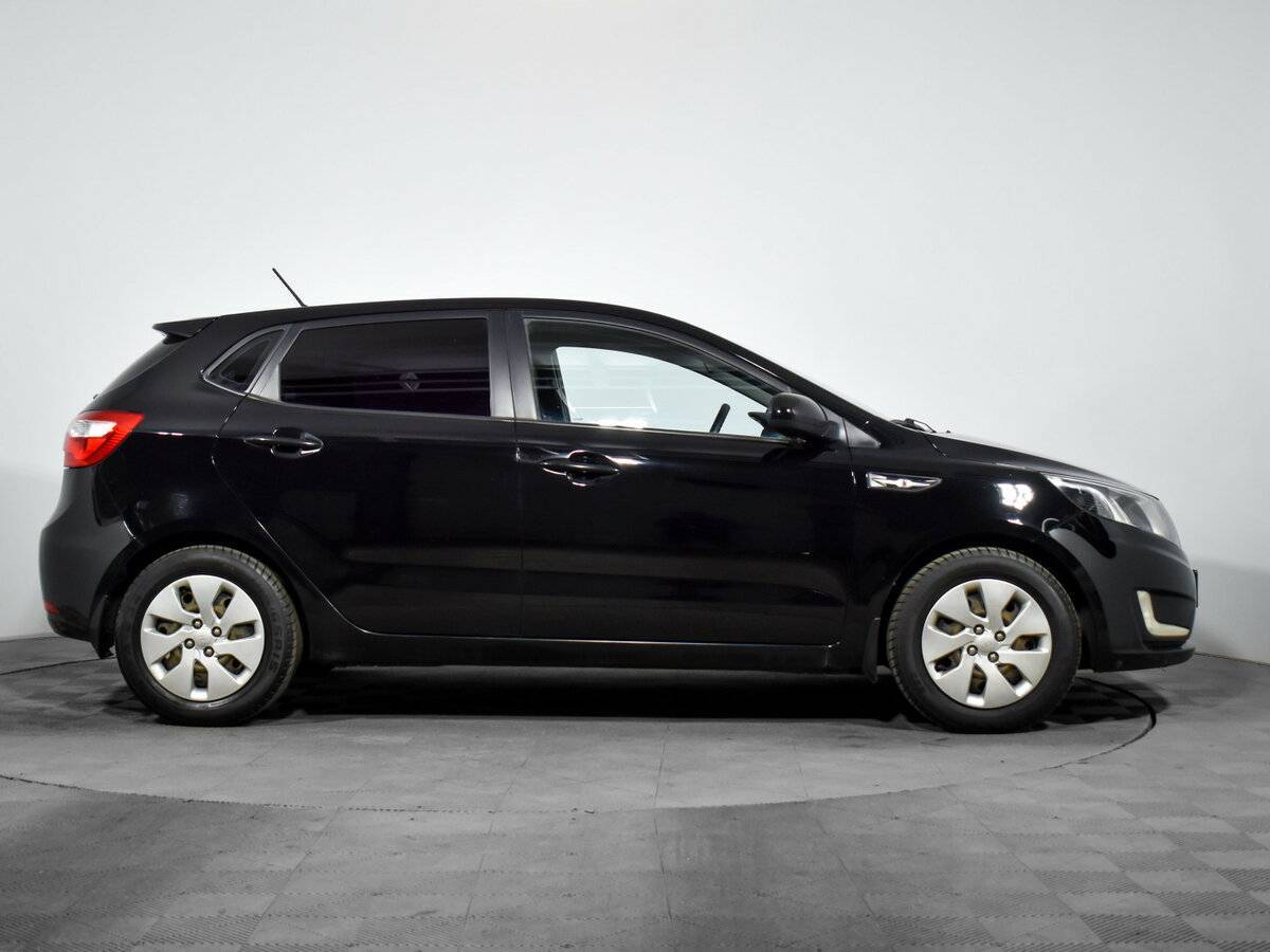 Kia Rio с пробегом — 2012 год. Фото: #3