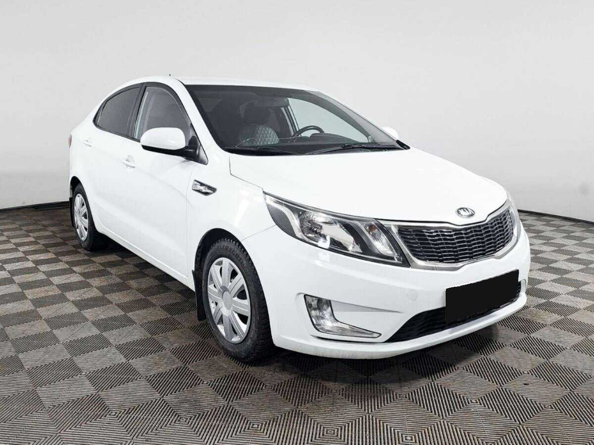 Kia Rio с пробегом — 2014 год. Фото: #2