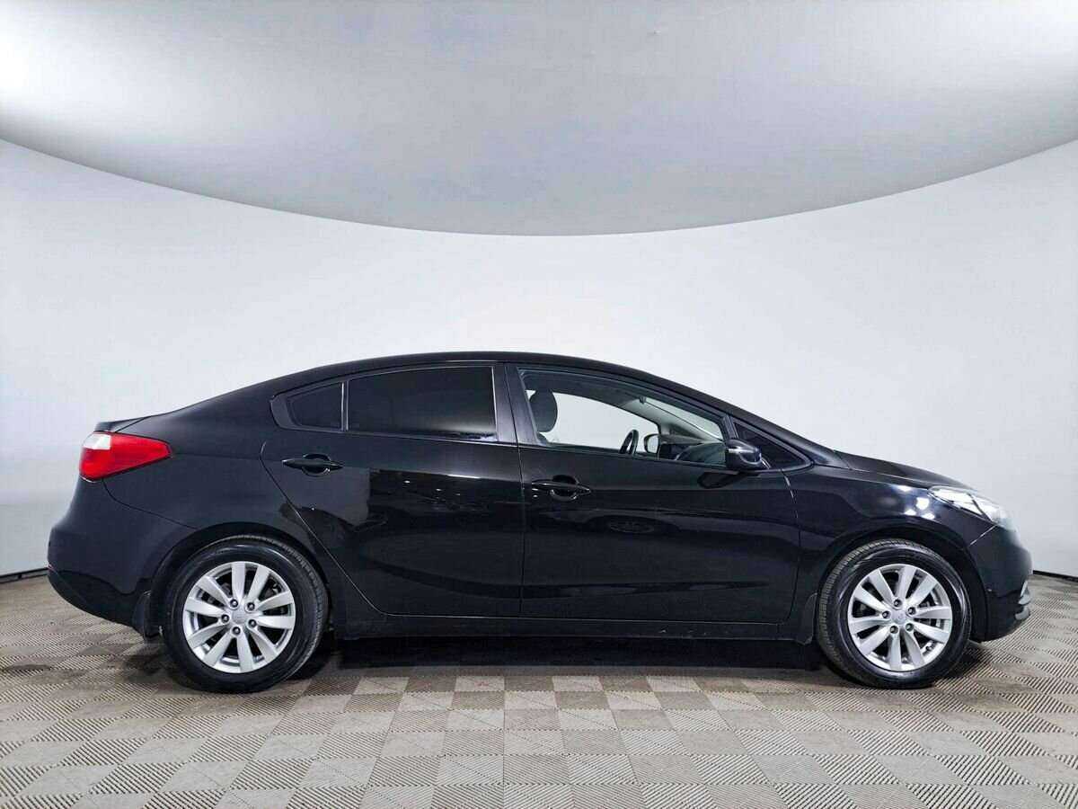 Kia Cerato с пробегом — 2014 год. Фото: #3