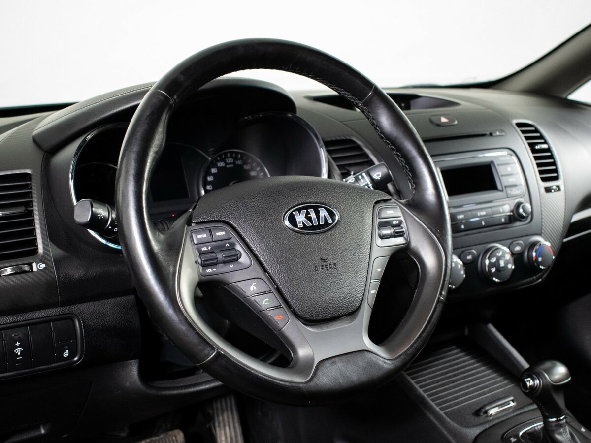 Kia Cerato с пробегом — 2015 год. Фото: #11