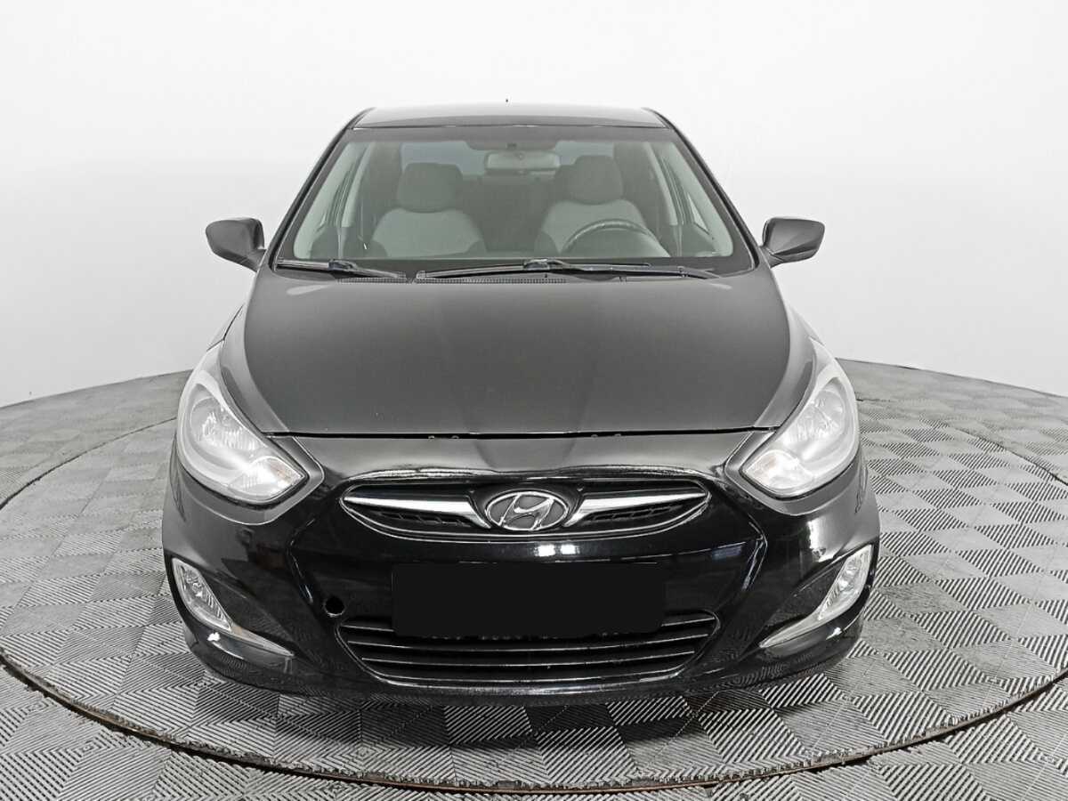 Hyundai Solaris с пробегом — 2013 год. Фото: #1