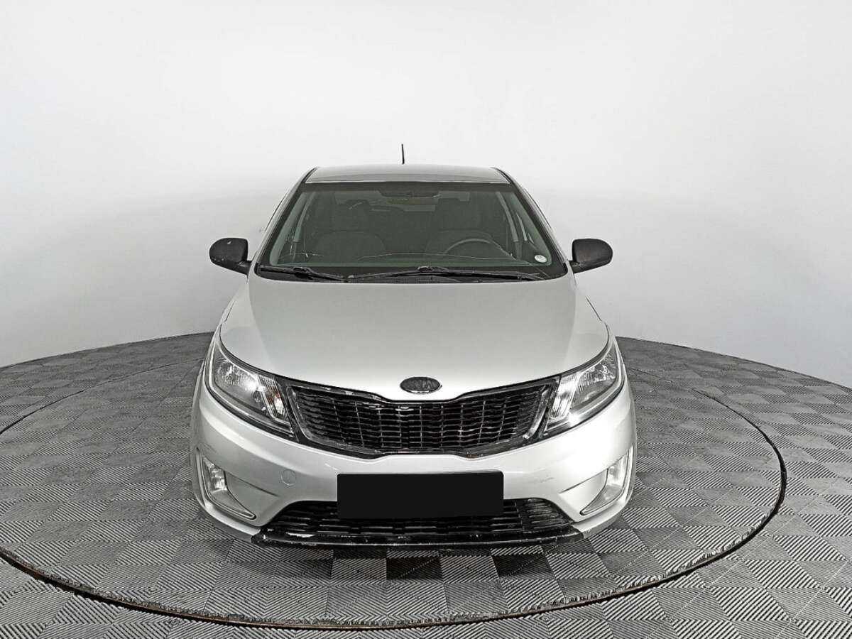 Kia Rio с пробегом — 2012 год. Фото: #1