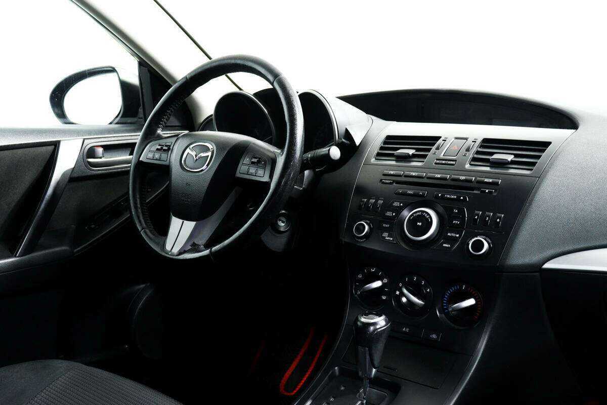 Mazda 3 с пробегом — 2013 год. Фото: #7