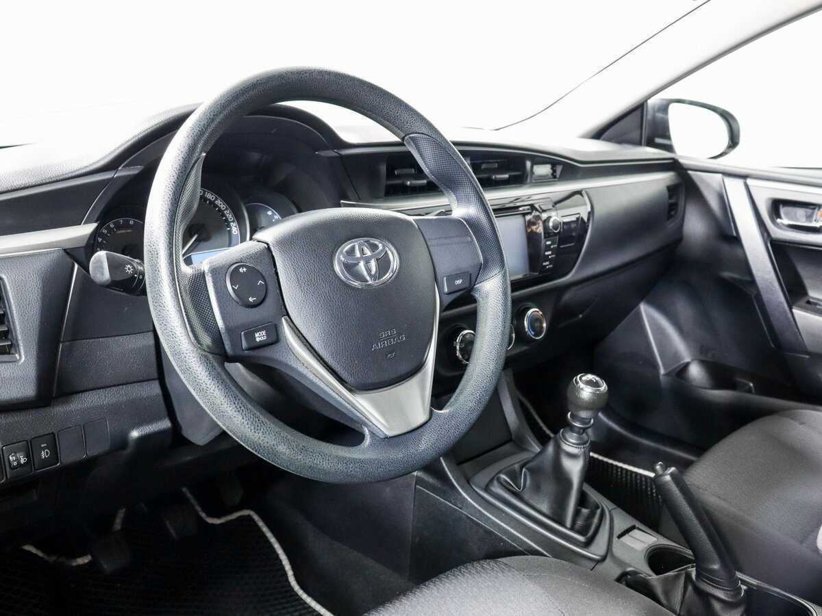 Toyota Corolla с пробегом — 2014 год. Фото: #13