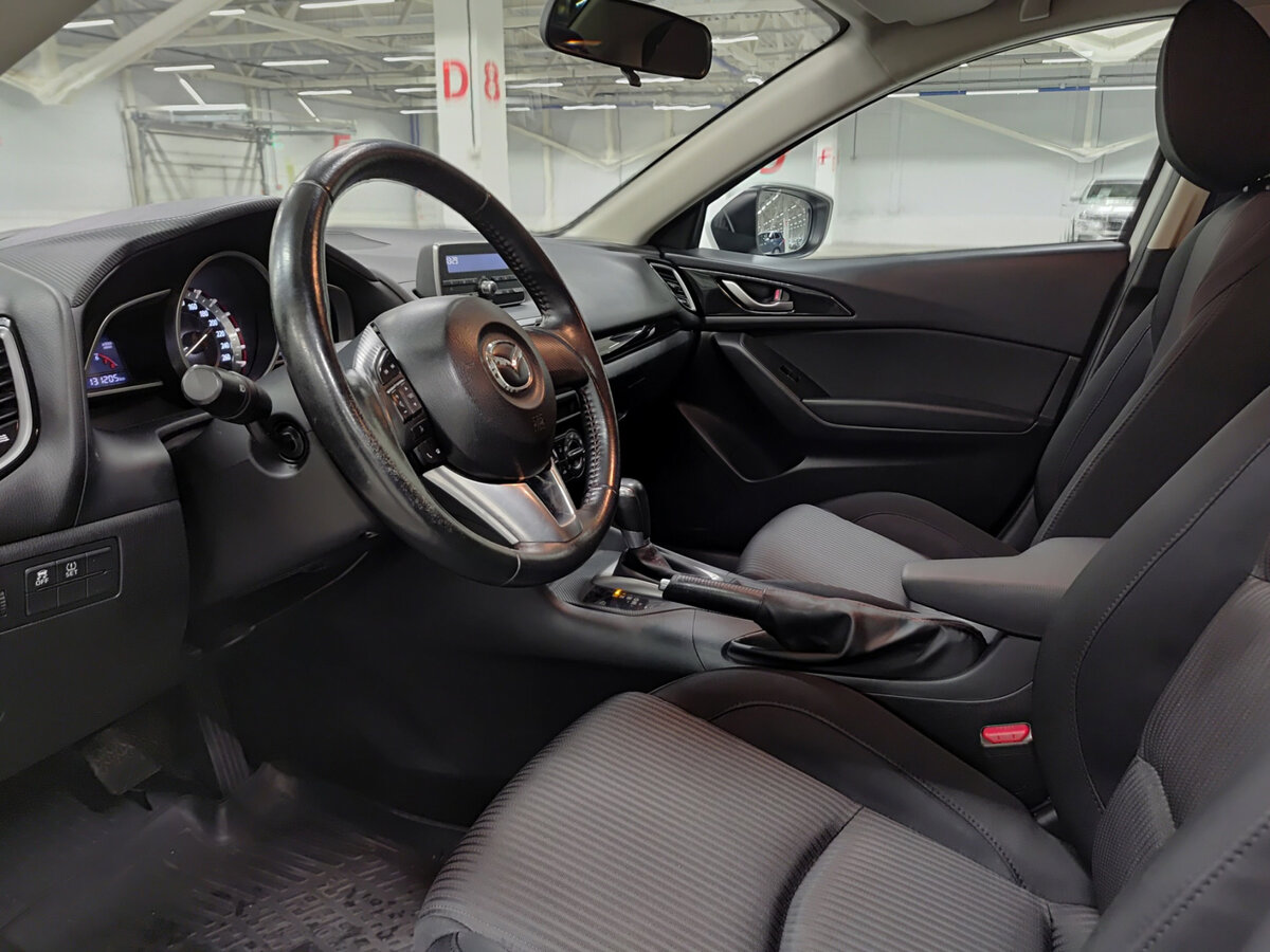 Mazda 3 с пробегом — 2014 год. Фото: #15