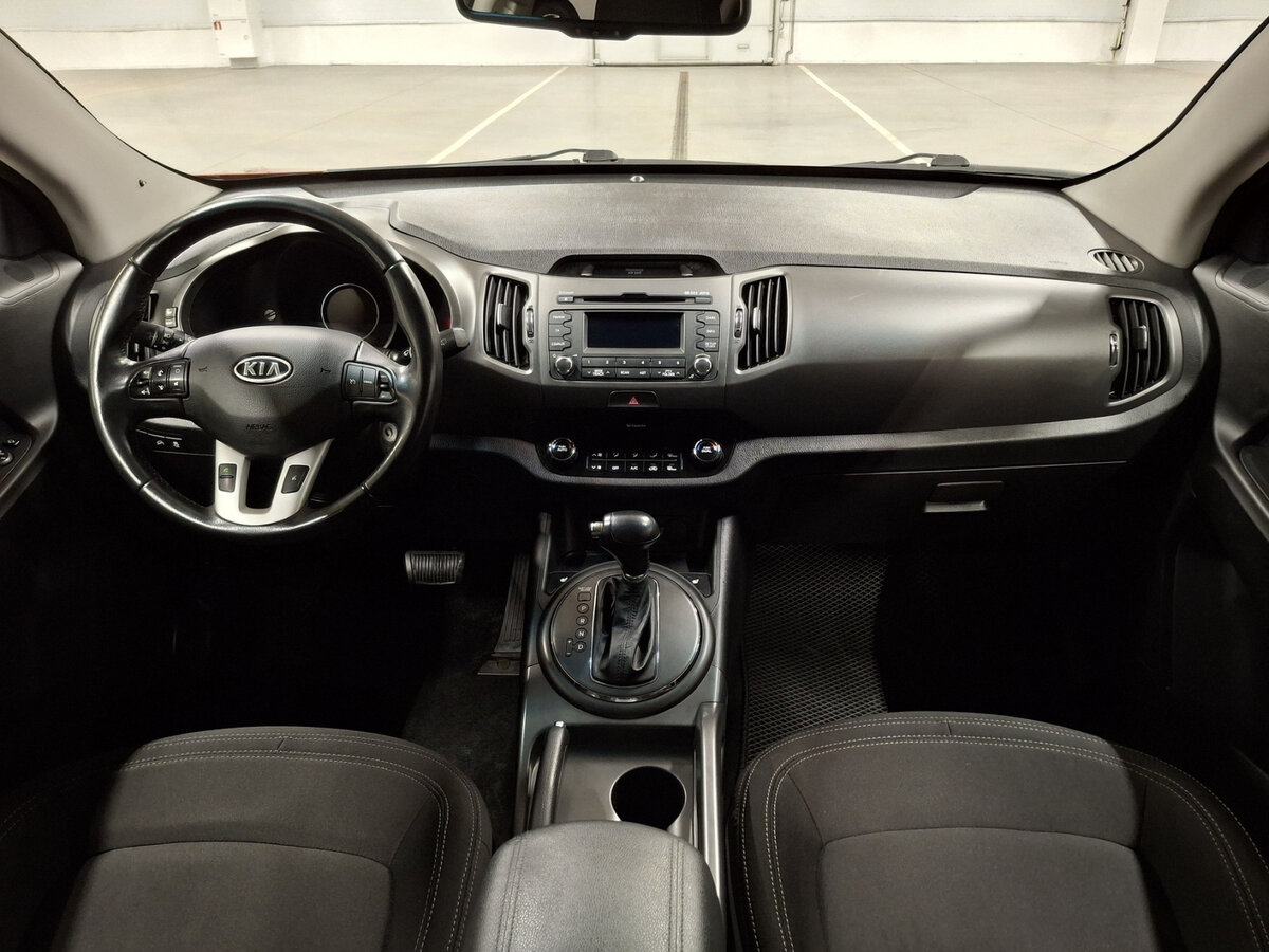 Kia Sportage с пробегом — 2012 год. Фото: #13