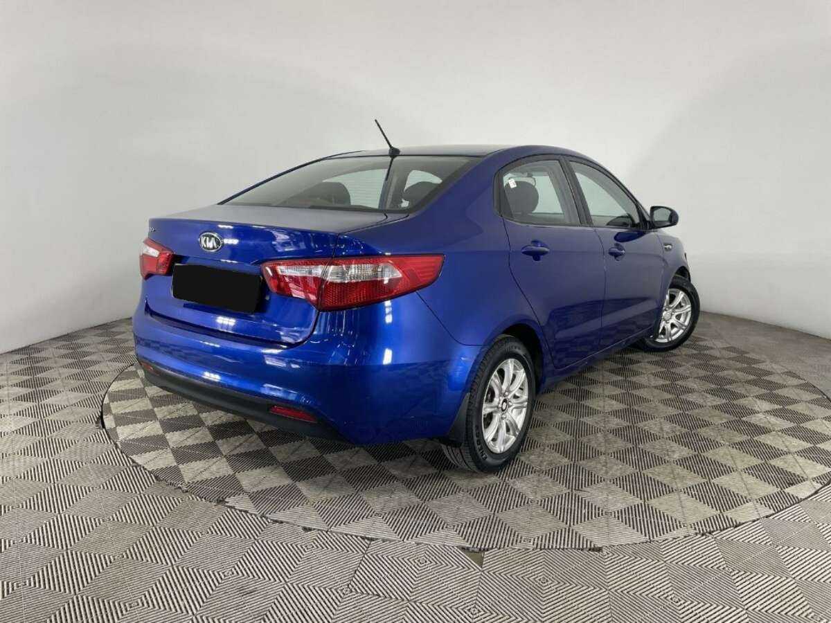 Kia Rio с пробегом — 2014 год. Фото: #5