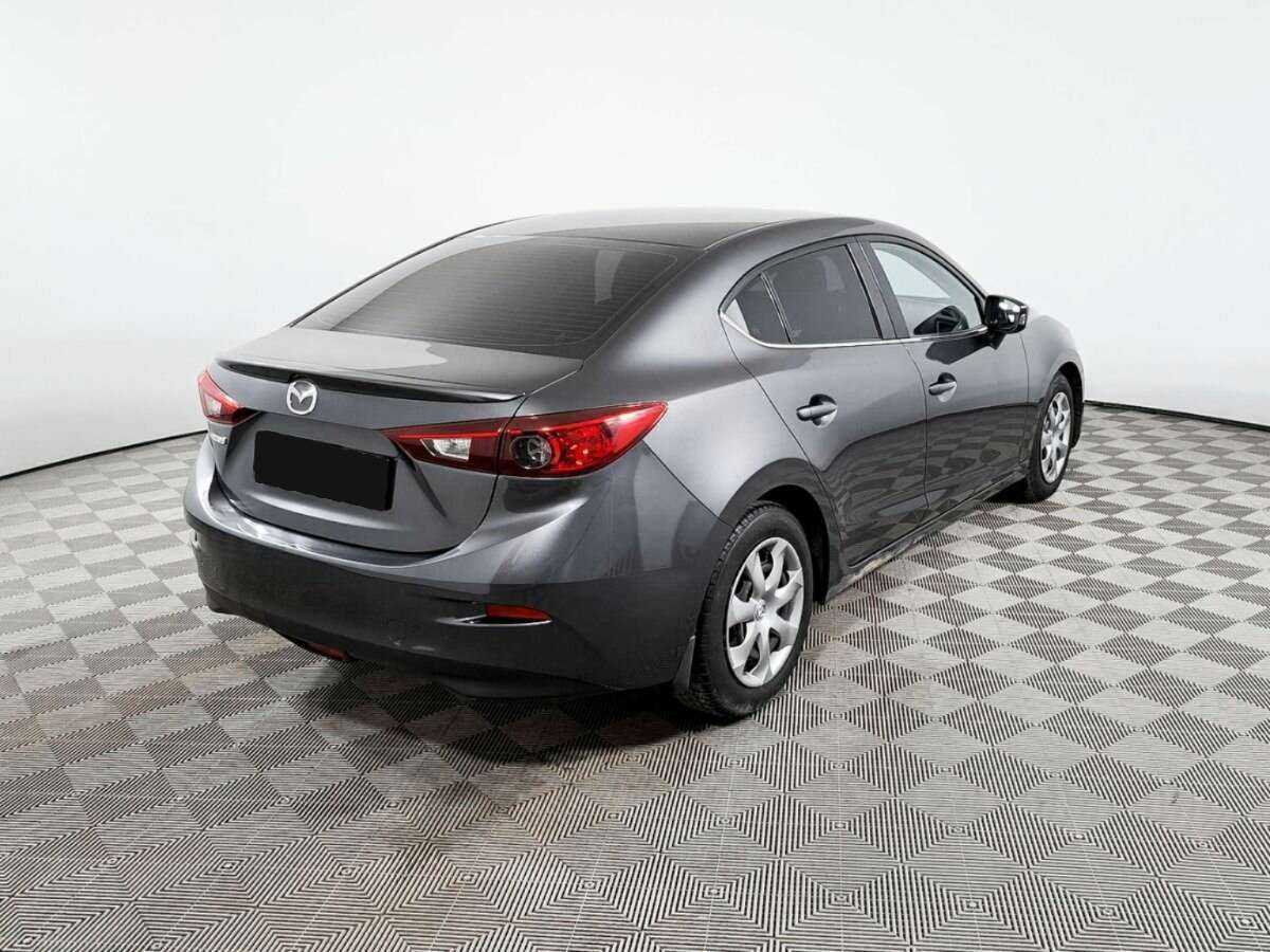Mazda 3 с пробегом — 2014 год. Фото: #3