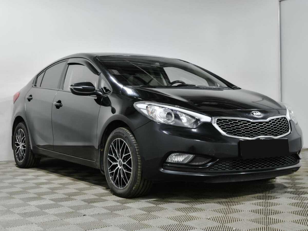 Kia Cerato с пробегом — 2014 год. Фото: #2