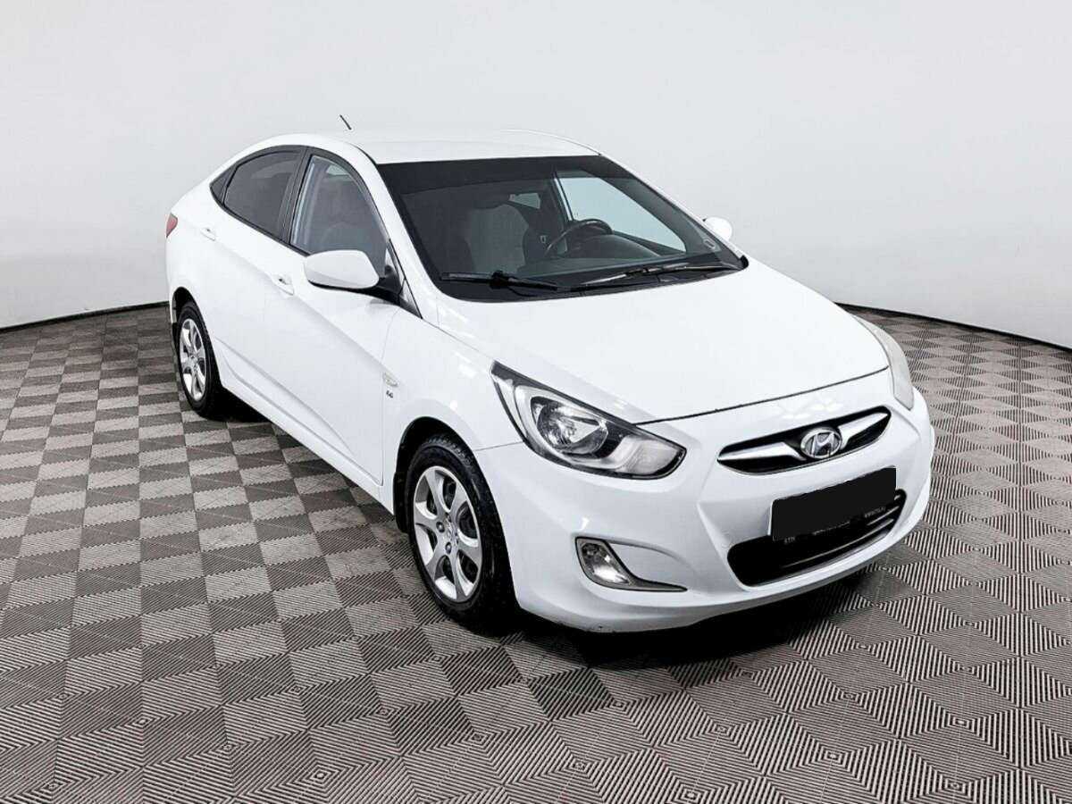Hyundai Solaris с пробегом — 2013 год. Фото: #2