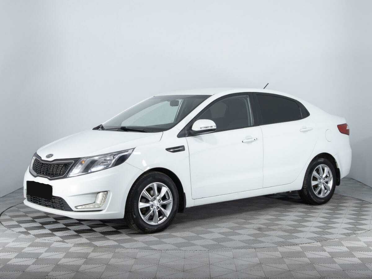 Kia Rio с пробегом — 2012 год. Фото: #0