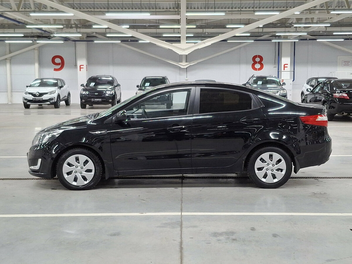 Kia Rio с пробегом — 2014 год. Фото: #7