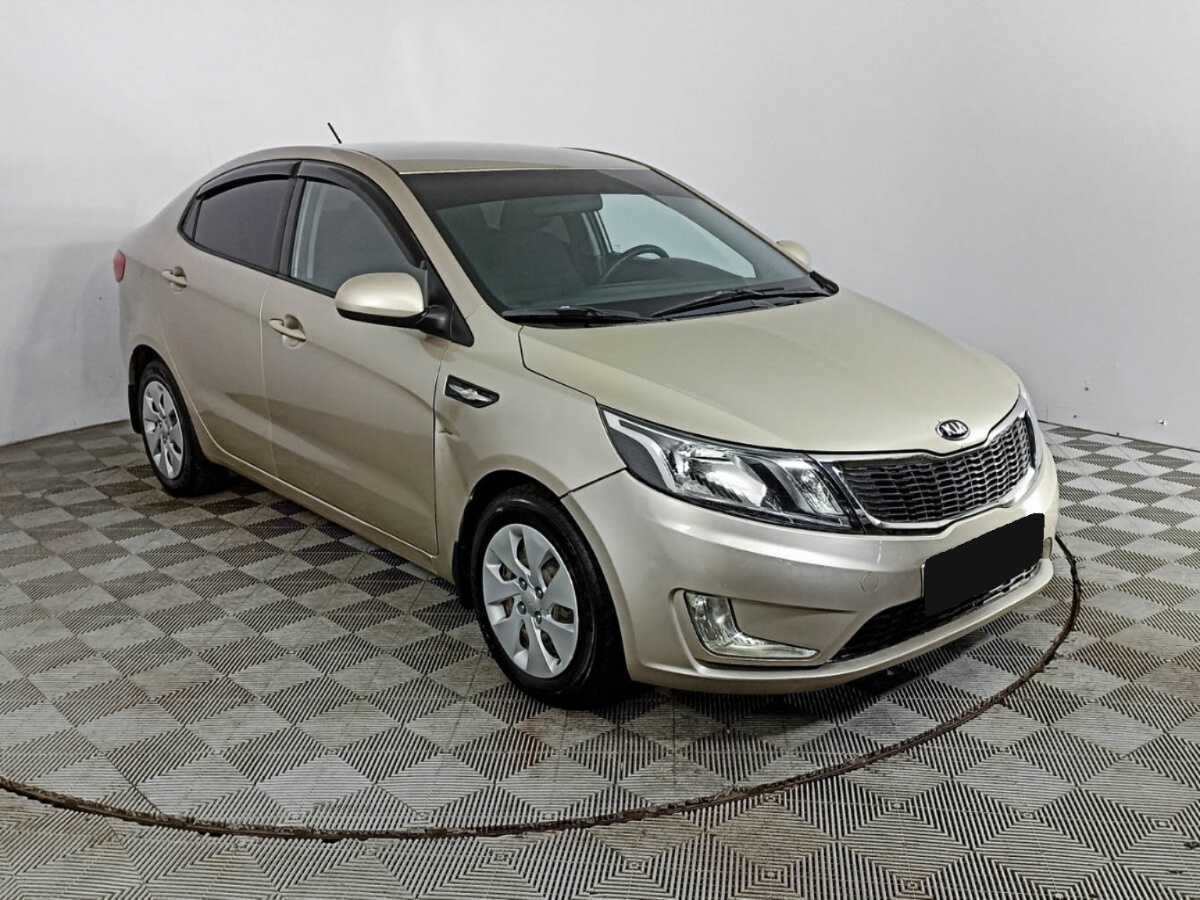 Kia Rio с пробегом — 2014 год. Фото: #2