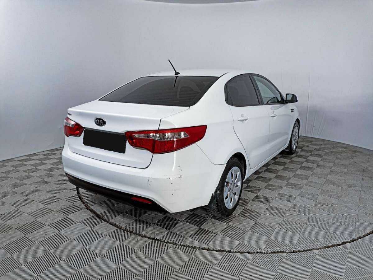 Kia Rio с пробегом — 2014 год. Фото: #4
