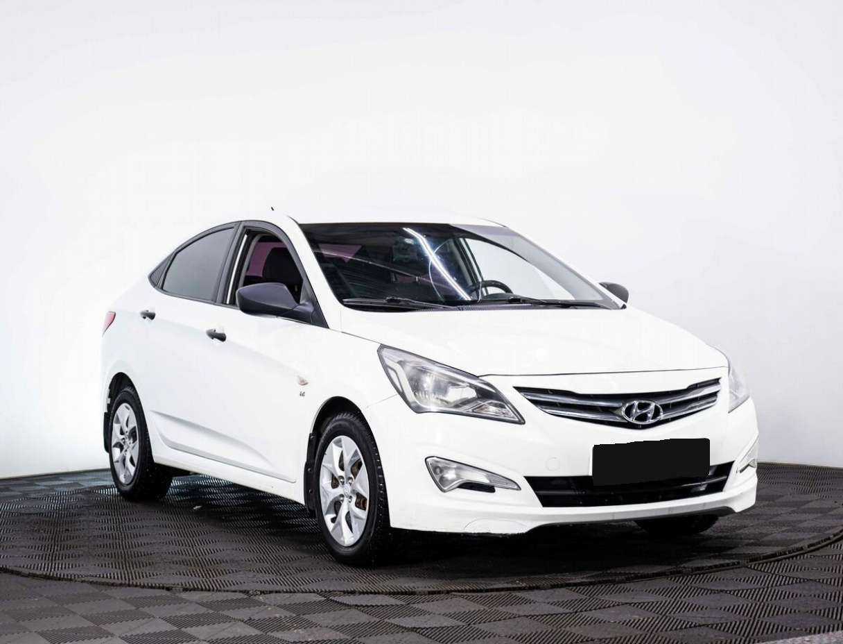 Hyundai Solaris с пробегом — 2014 год. Фото: #2