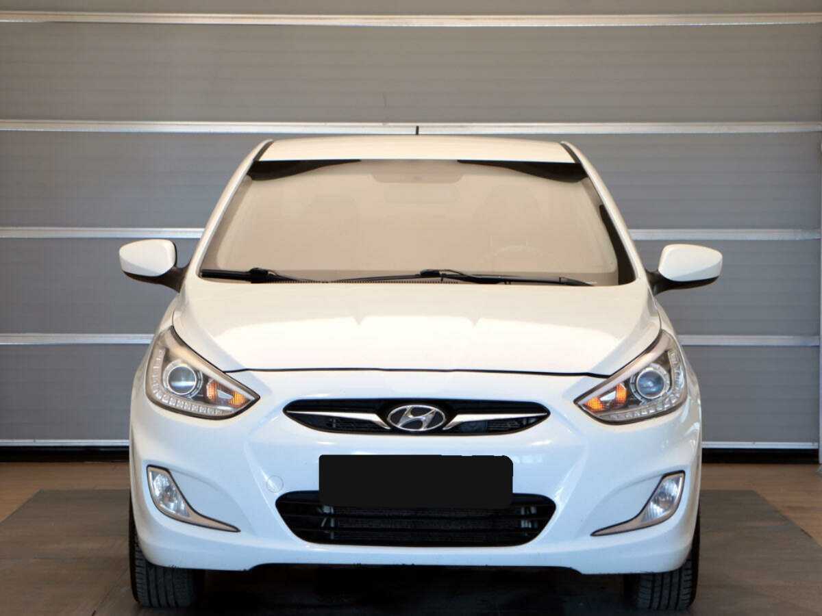 Hyundai Solaris с пробегом — 2013 год. Фото: #1
