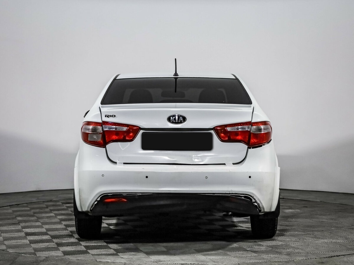 Kia Rio с пробегом — 2013 год. Фото: #4