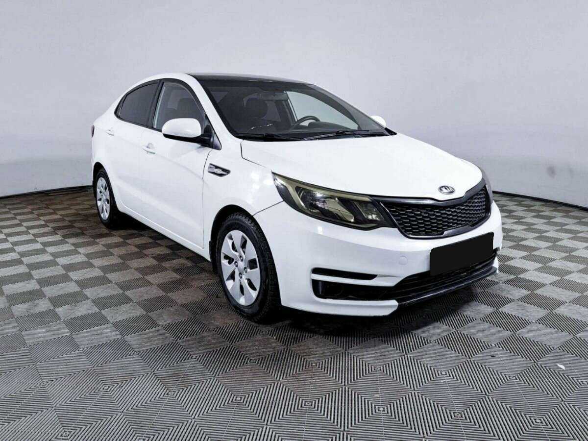 Kia Rio с пробегом — 2015 год. Фото: #2