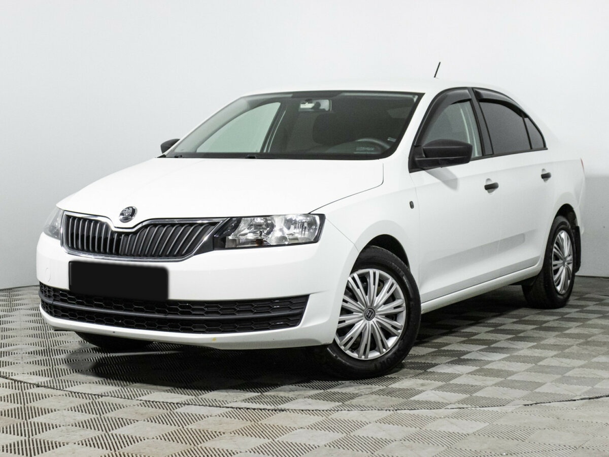 Skoda Rapid с пробегом — 2015 год. Посмотреть фото