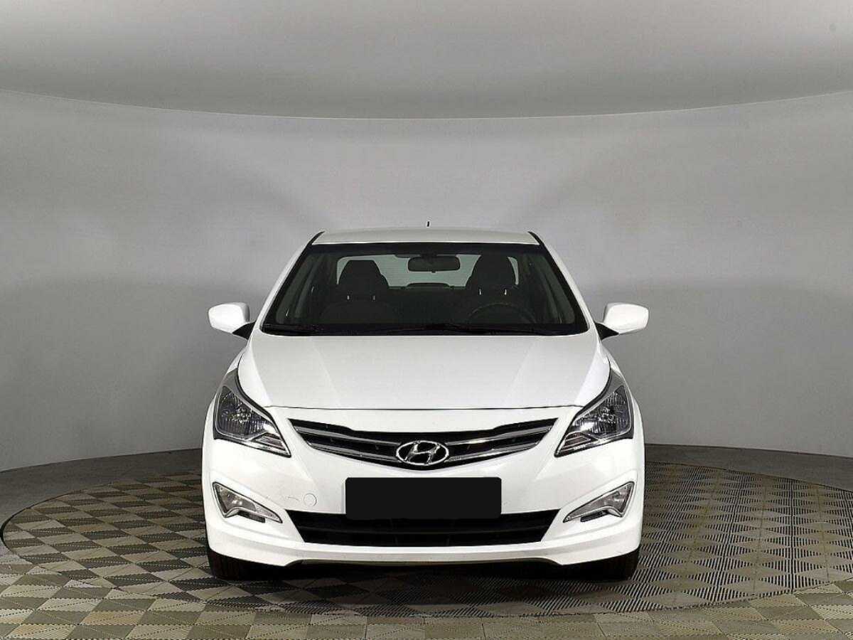 Hyundai Solaris с пробегом — 2014 год. Фото: #2