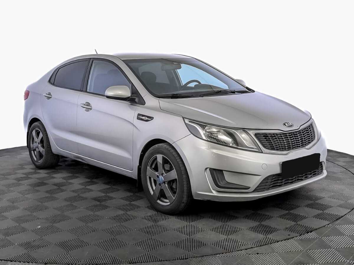 Kia Rio с пробегом — 2014 год. Фото: #2