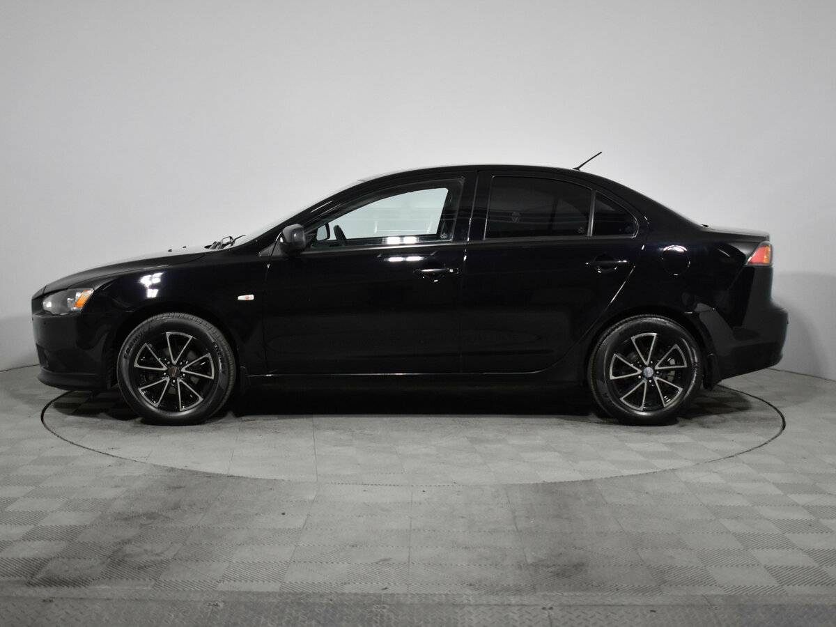 Mitsubishi Lancer с пробегом — 2012 год. Фото: #7