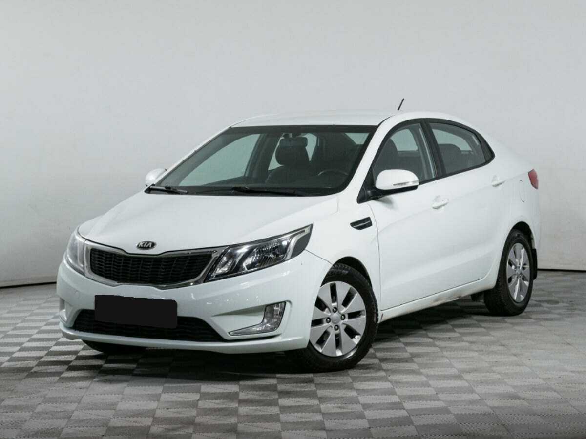 Kia Rio с пробегом — 2013 год. Фото: #0