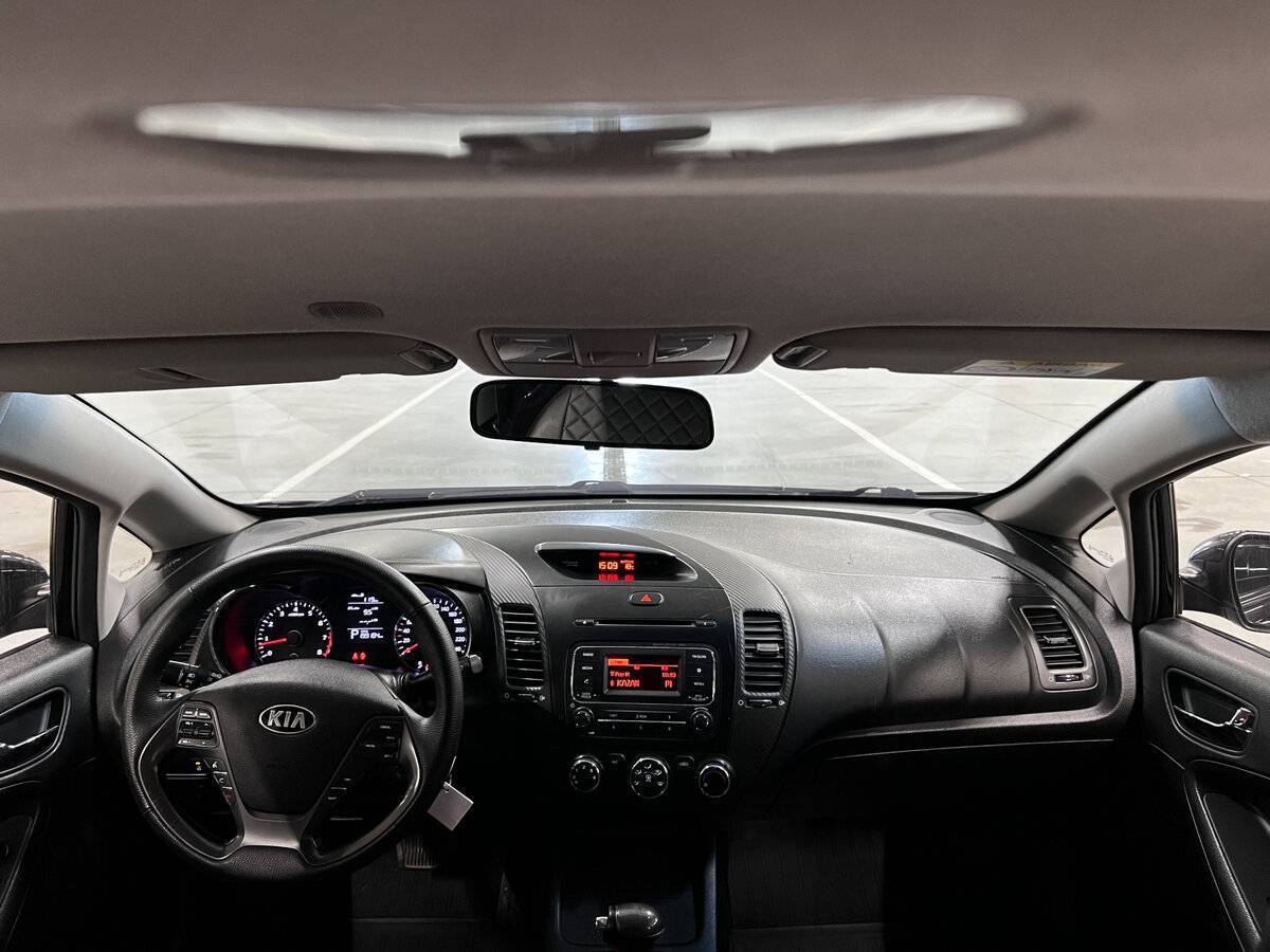 Kia Cerato с пробегом — 2014 год. Фото: #13