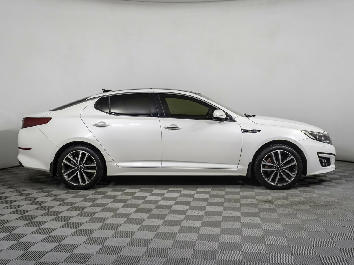 Kia Optima с пробегом — 2013 год. Фото: #3