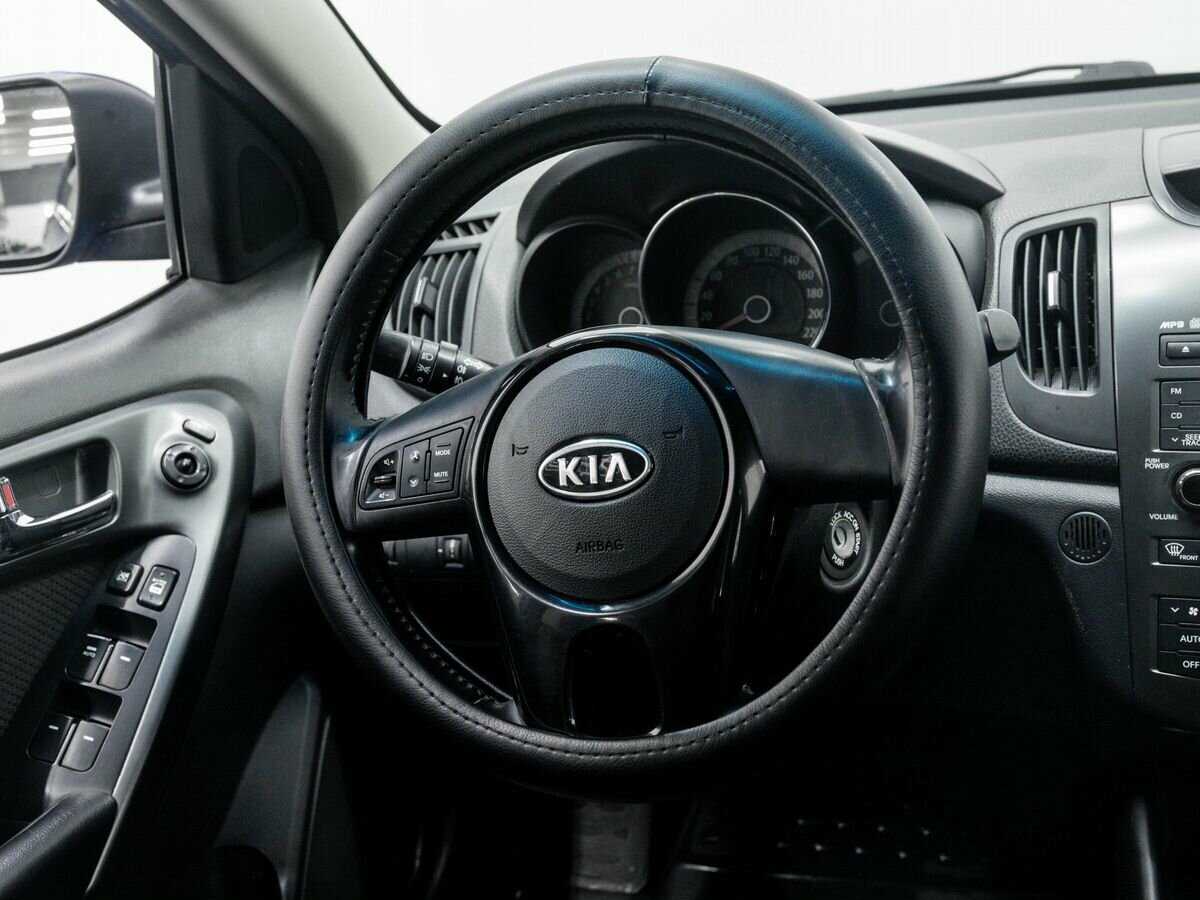 Kia Cerato с пробегом — 2012 год. Фото: #10